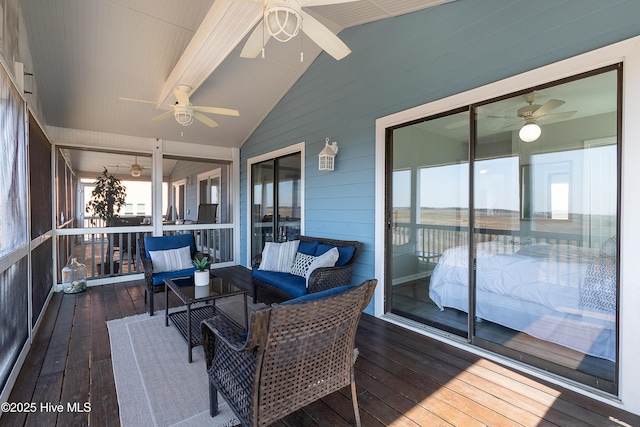 sunroom / solarium with lofted ceiling with beams and ceiling fan