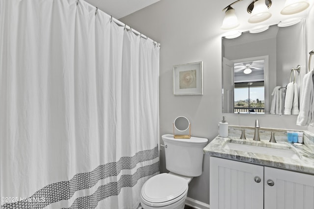 full bathroom featuring toilet and vanity