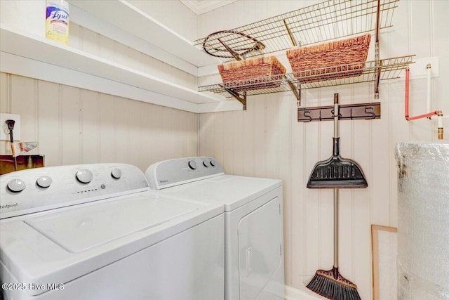 laundry room with separate washer and dryer