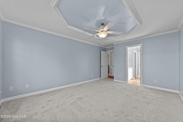 carpeted spare room with ornamental molding and ceiling fan