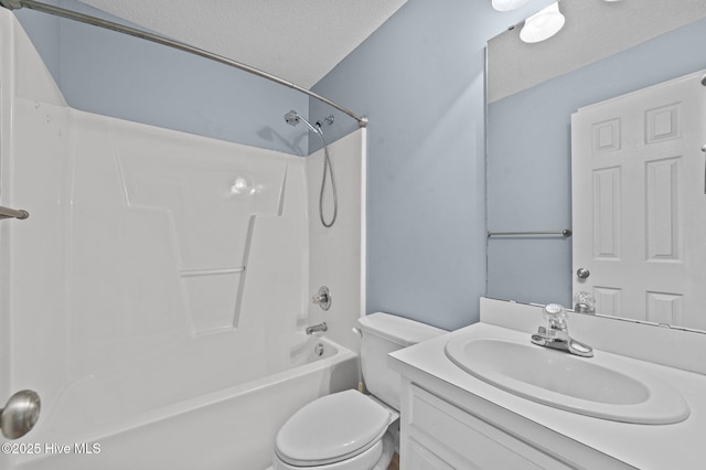 full bathroom featuring shower / washtub combination, vanity, a textured ceiling, and toilet