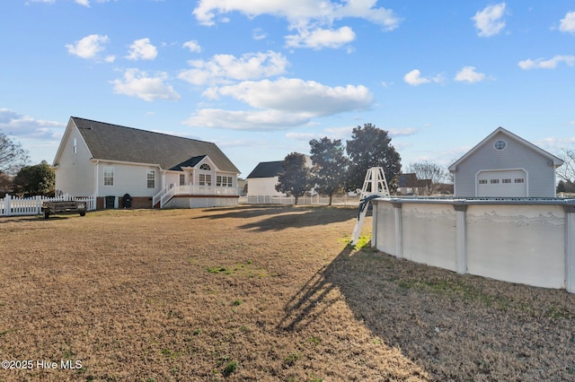 view of yard with a garage