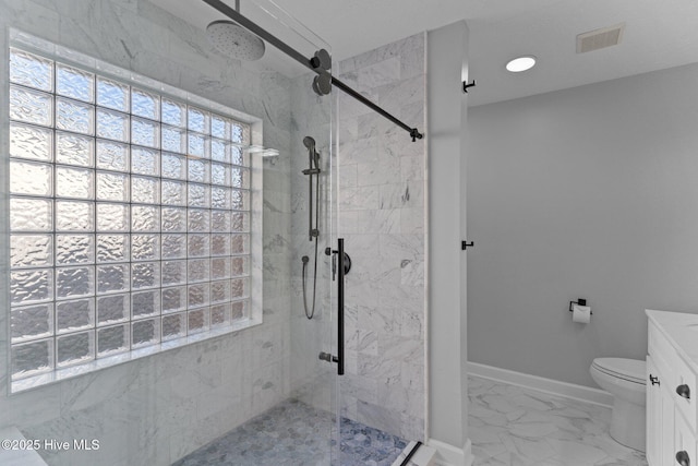 6148 Sugar Pine Dr, Wilmington, NC 28412 - full bath with a marble finish shower, marble look tile flooring, toilet, and baseboards