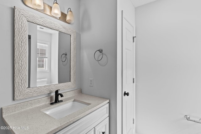 6148 Sugar Pine Dr, Wilmington, NC 28412 - bathroom featuring vanity and toilet