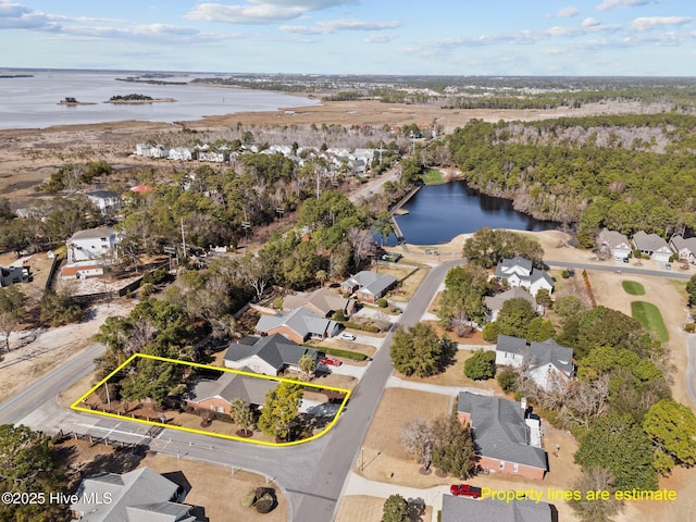 drone / aerial view with a water view