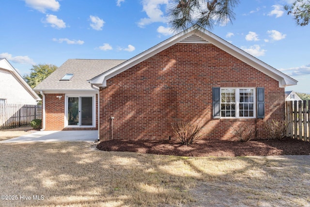 6148 Sugar Pine Dr, Wilmington, NC 28412 - rear view of property featuring brick siding and a patio area