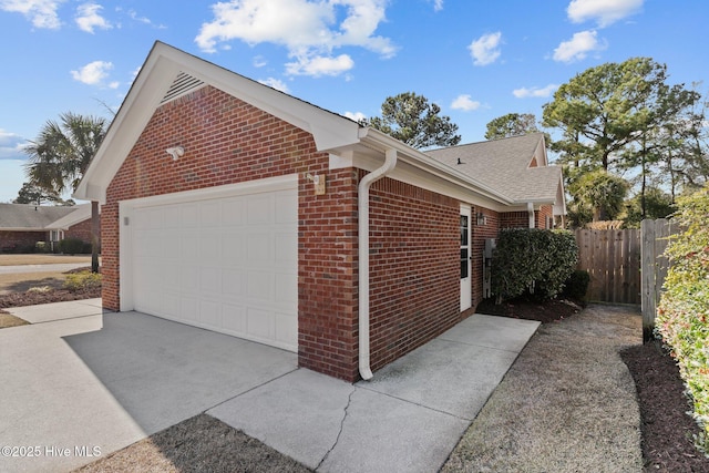 view of property exterior with a garage