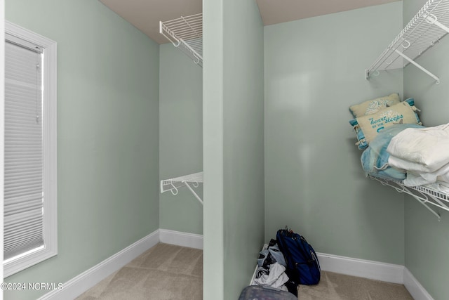 bathroom featuring tile patterned floors, ornamental molding, and vanity