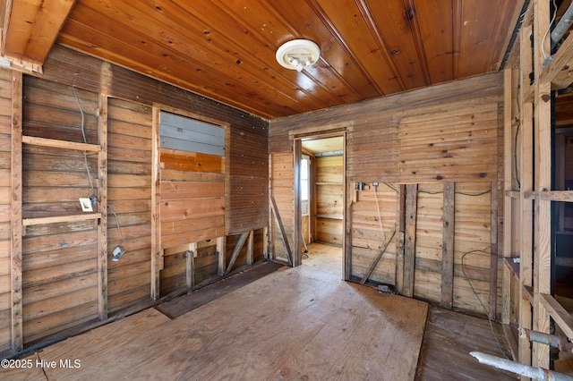 unfurnished room featuring wood ceiling