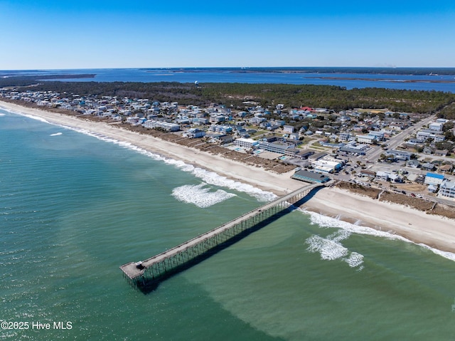 drone / aerial view with a view of the beach and a water view