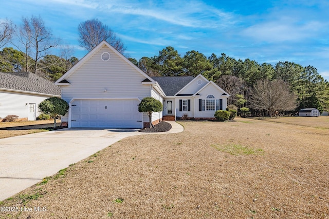 ranch-style home with a front yard and a garage