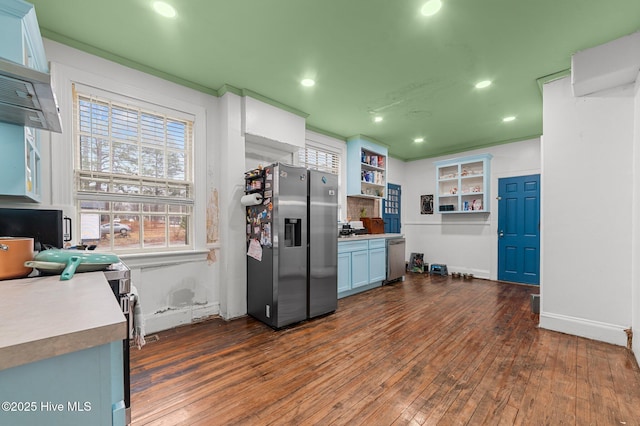 kitchen featuring dark wood finished floors, open shelves, recessed lighting, light countertops, and appliances with stainless steel finishes