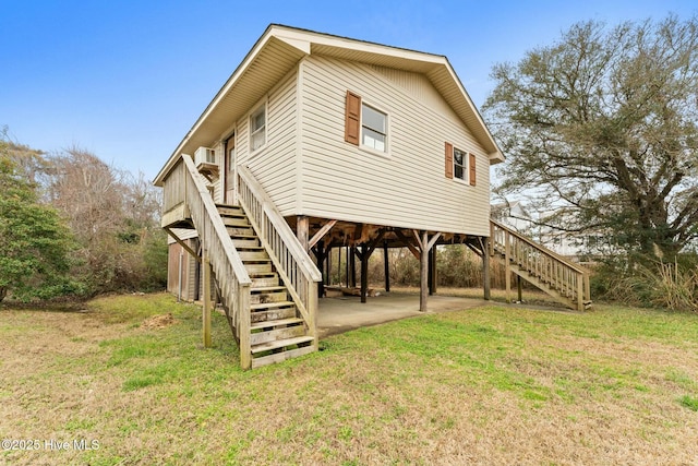 back of house with a yard