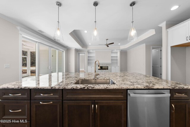 details with tasteful backsplash, stainless steel gas stovetop, white cabinetry, and light stone countertops