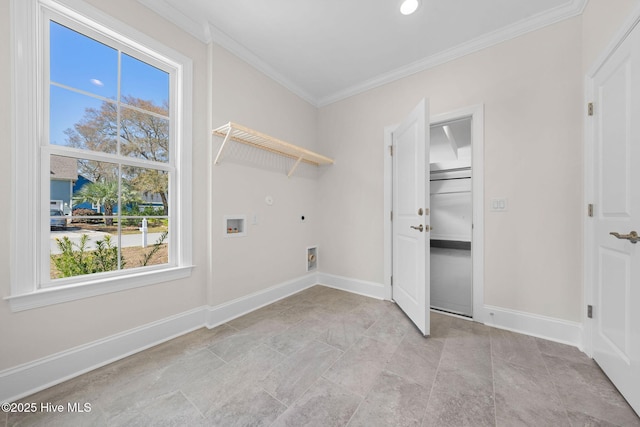 bathroom with a sink, ornamental molding, tiled shower, and marble finish floor