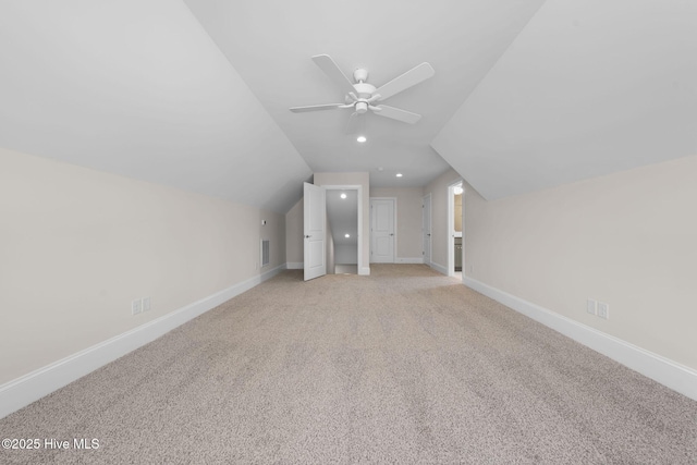 bonus room featuring visible vents, baseboards, ceiling fan, and vaulted ceiling