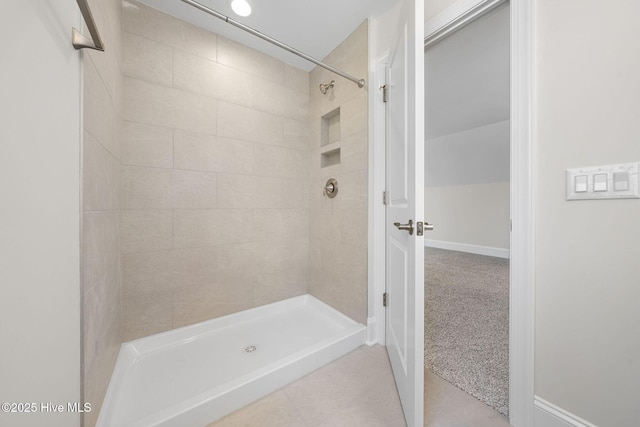 additional living space with ceiling fan, baseboards, carpet flooring, and lofted ceiling