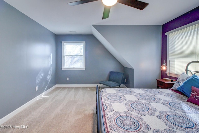 bedroom featuring a ceiling fan, carpet flooring, and baseboards