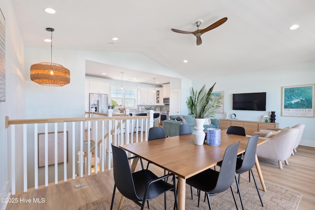 dining room featuring recessed lighting, a ceiling fan, light wood-style flooring, and vaulted ceiling