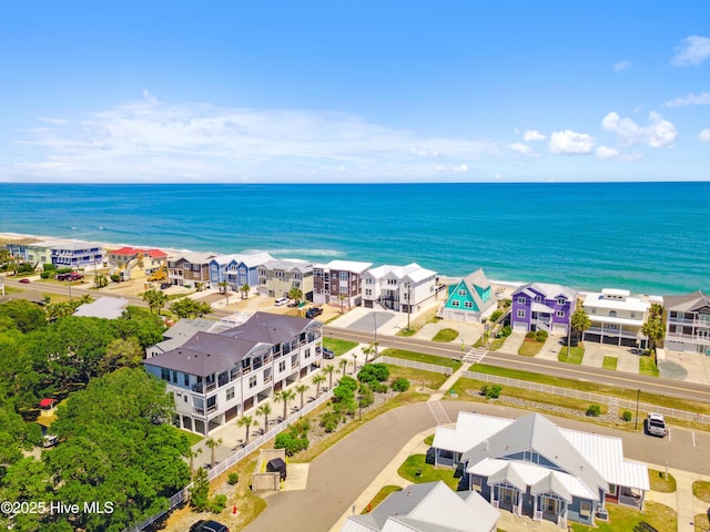 bird's eye view featuring a residential view and a water view