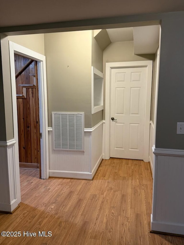 corridor featuring light wood-type flooring