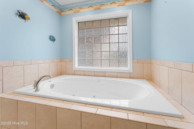 bathroom featuring a relaxing tiled tub