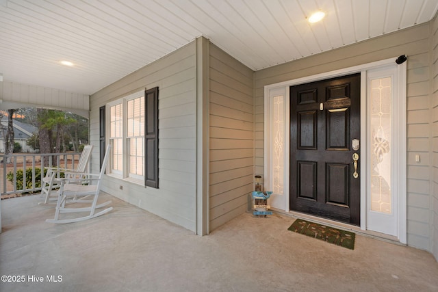 entrance to property with covered porch