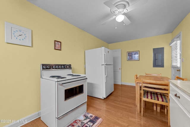 kitchen with white appliances, light wood finished floors, electric panel, baseboards, and a ceiling fan