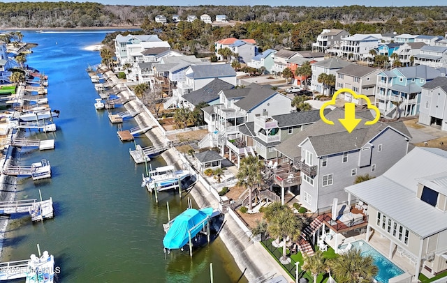 aerial view featuring a water view and a residential view