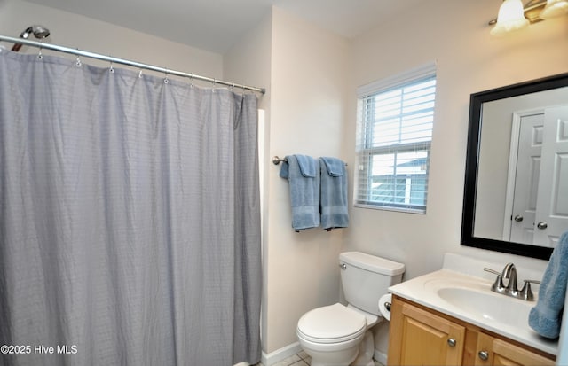 full bath featuring vanity and toilet