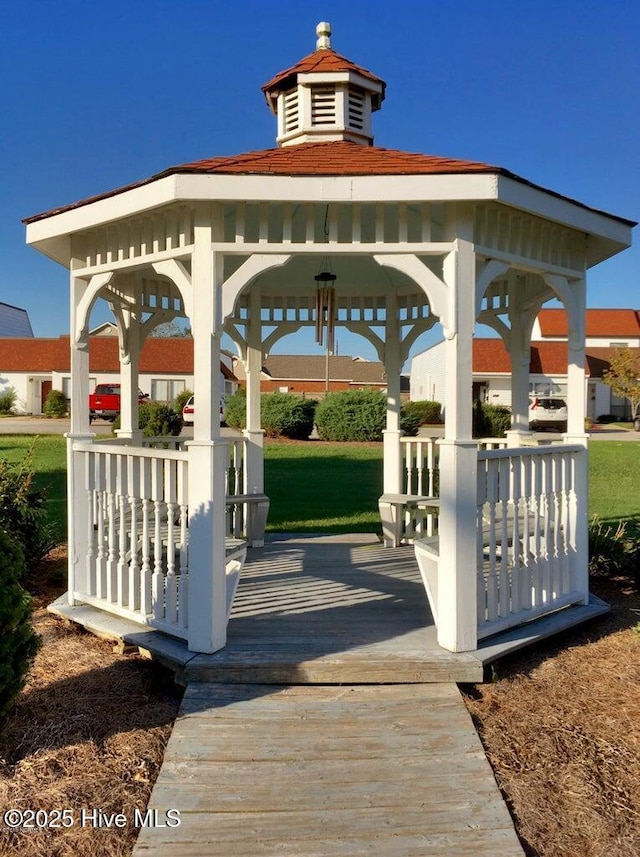 view of community with a gazebo and a yard