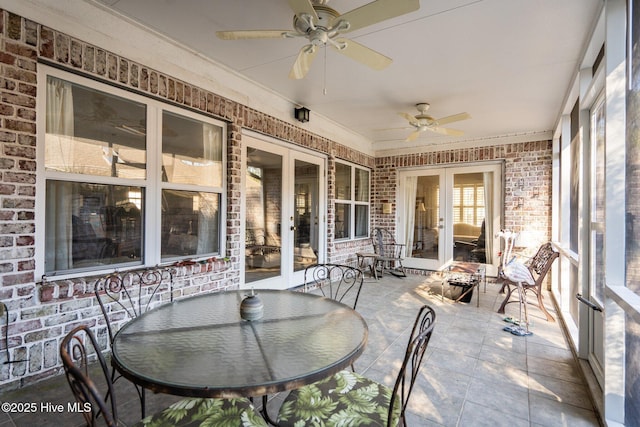 sunroom featuring french doors