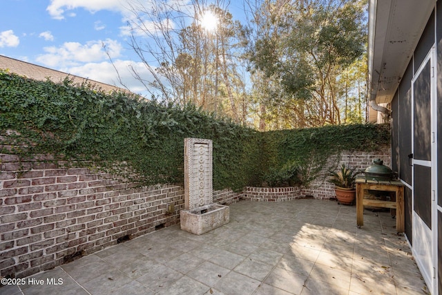 view of patio with a fenced backyard