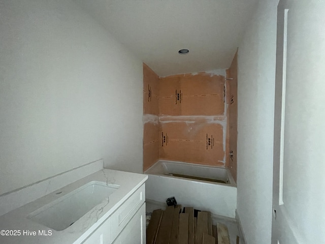 bathroom with vanity and shower / bath combination