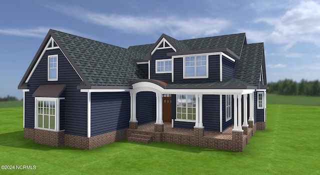 view of front of home featuring a front yard and roof with shingles