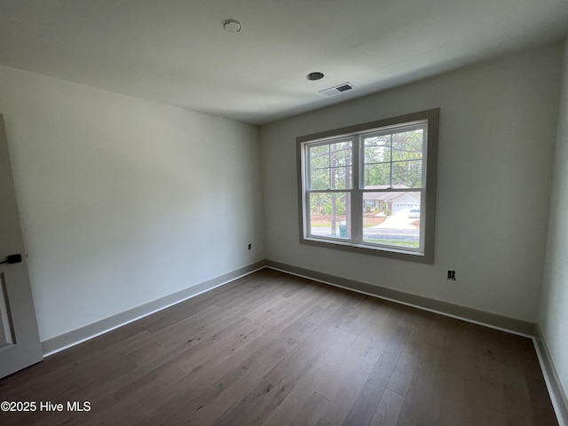 241 Juniper Creek Blvd, Pinehurst, NC 28374 - unfurnished room featuring dark wood-style flooring and baseboards