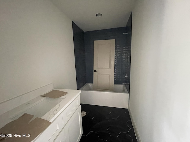 241 Juniper Creek Blvd, Pinehurst, NC 28374 - full bathroom featuring a tub to relax in, tile patterned floors, and vanity