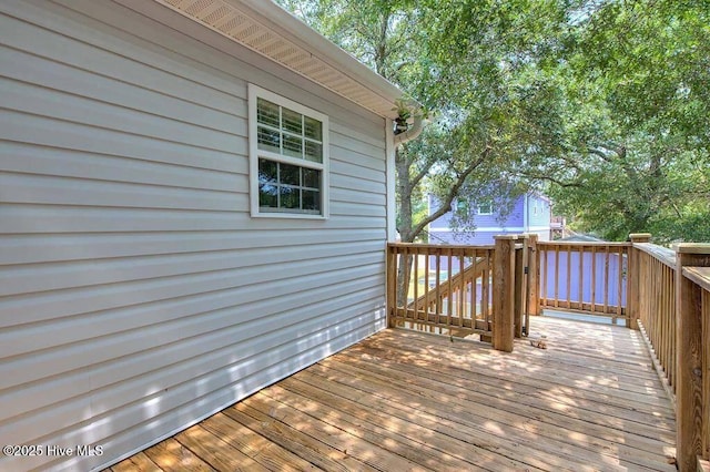 106 NE 62nd St, Oak Island, NC 28465 - view of wooden deck