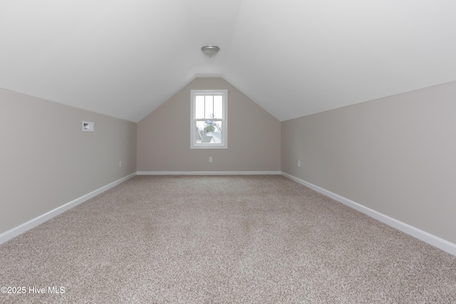 125 Neeley Ln, New Bern, NC 28560 - bonus room featuring baseboards, light colored carpet, and lofted ceiling