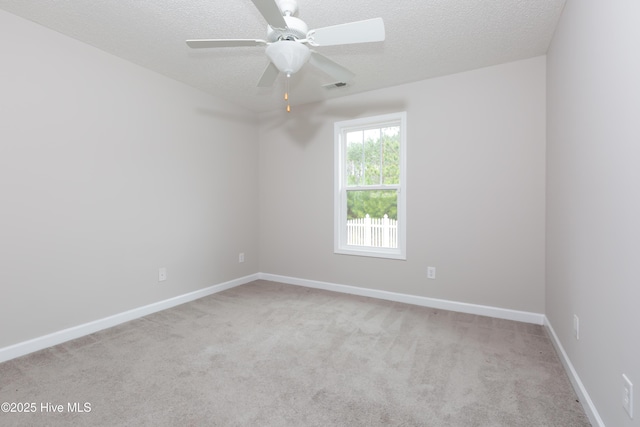 125 Neeley Ln, New Bern, NC 28560 - carpeted empty room featuring baseboards, a ceiling fan, french doors, and a textured ceiling
