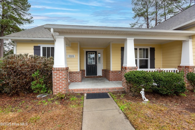 125 Neeley Ln, New Bern, NC 28560 - rear view of house featuring fence and roof with shingles