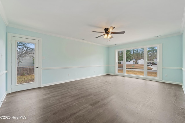 spare room with hardwood / wood-style flooring, ornamental molding, and ceiling fan