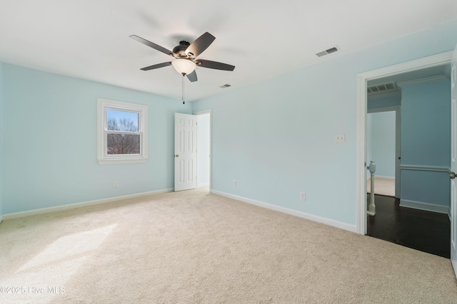 unfurnished bedroom featuring carpet floors and ceiling fan