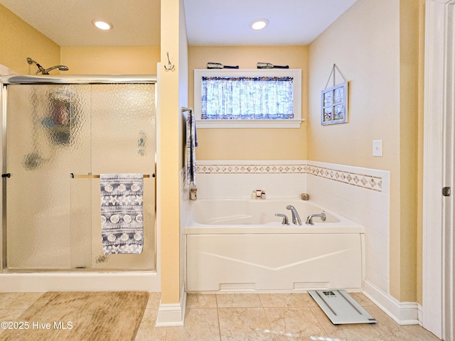 bathroom featuring tile patterned floors and plus walk in shower