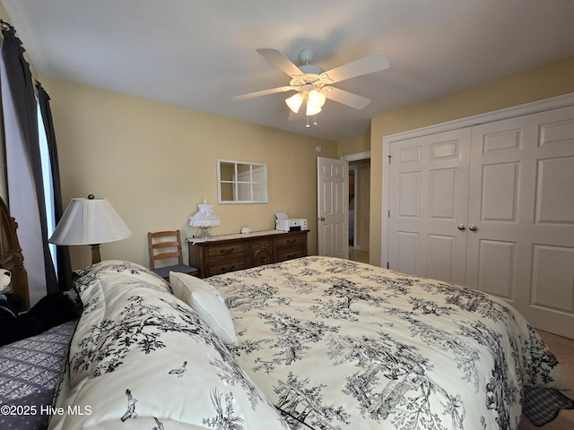 bedroom with ceiling fan and a closet