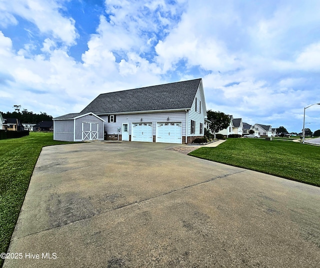 view of side of property with a storage shed and a lawn