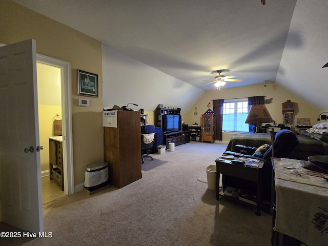 office with light carpet, lofted ceiling, and ceiling fan