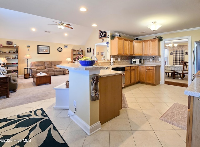 kitchen with tasteful backsplash, vaulted ceiling, kitchen peninsula, and light tile patterned flooring