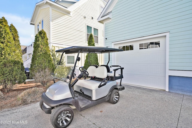 exterior space with a garage and driveway
