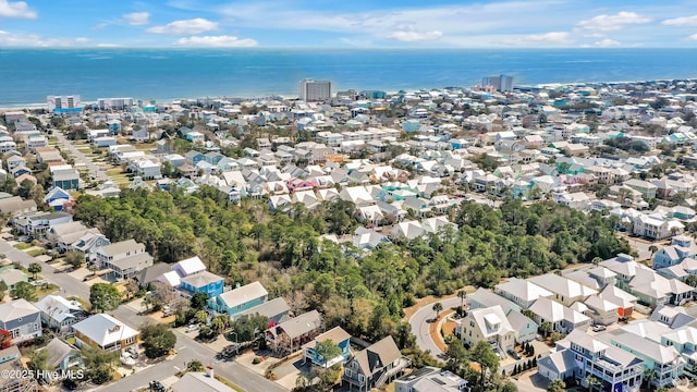 bird's eye view featuring a water view and a residential view